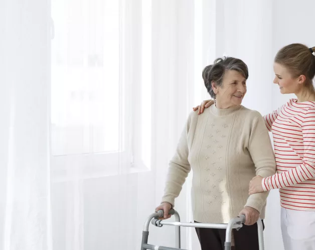 girl-with-her-arm-around-her-grandma-with-a-walker-2025-10-03-21-32-36-utc
